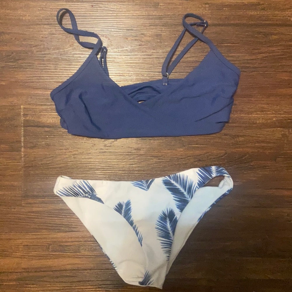 cross cross bikini top w/ blue leafy bottoms